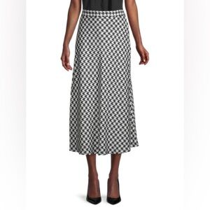 EQUIPMENT
Women's Iva Houndstooth Midi Skirt In Black Natural
350.00$
